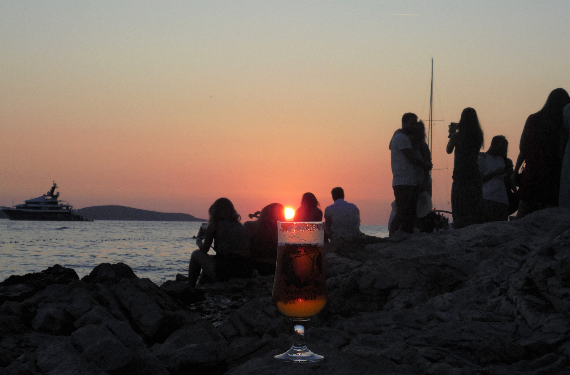 Vunetovo craft beer on the Hvar waterfront at sunset